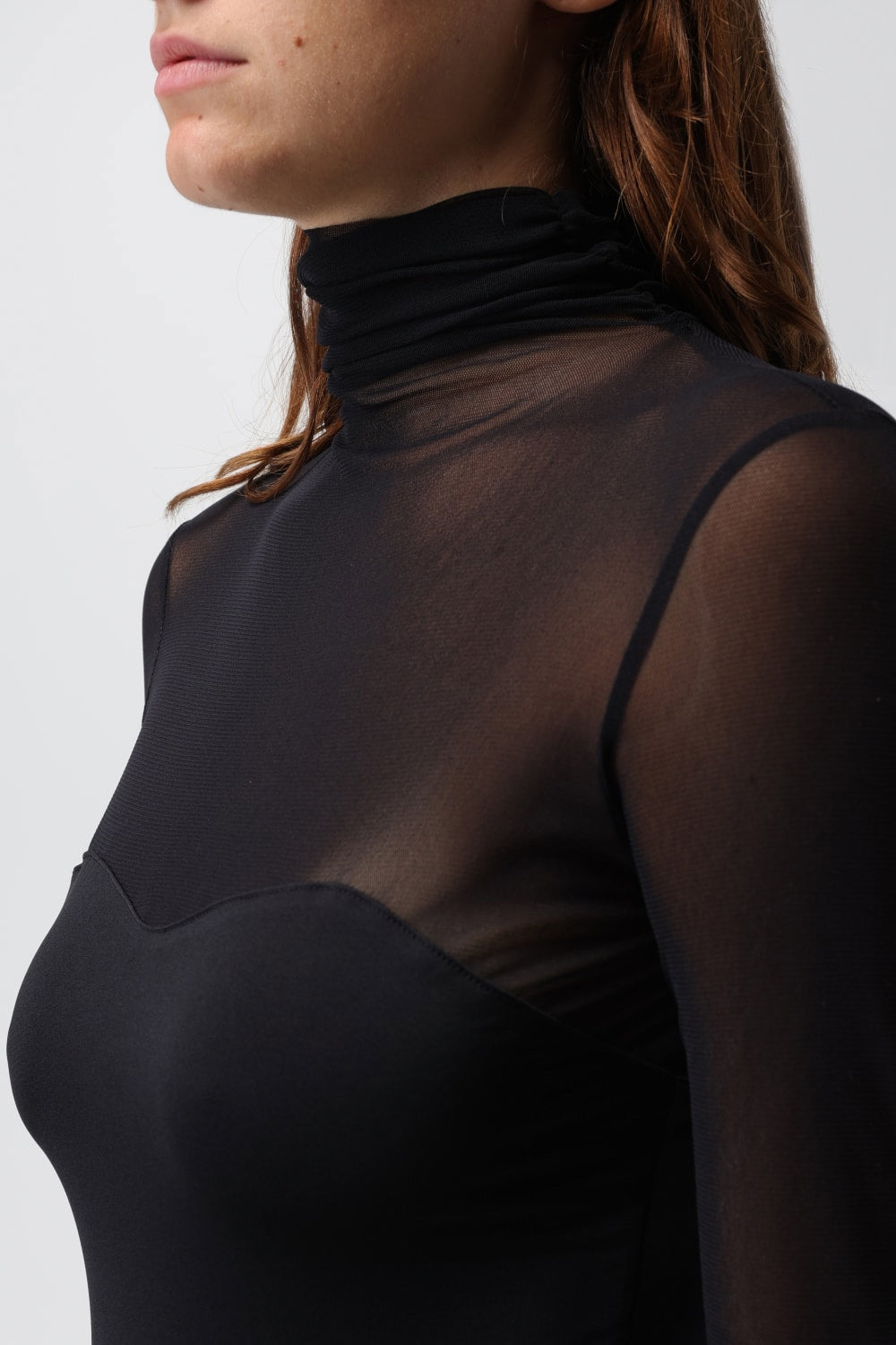 SIMONA CORSELLINI Body con trasparenze