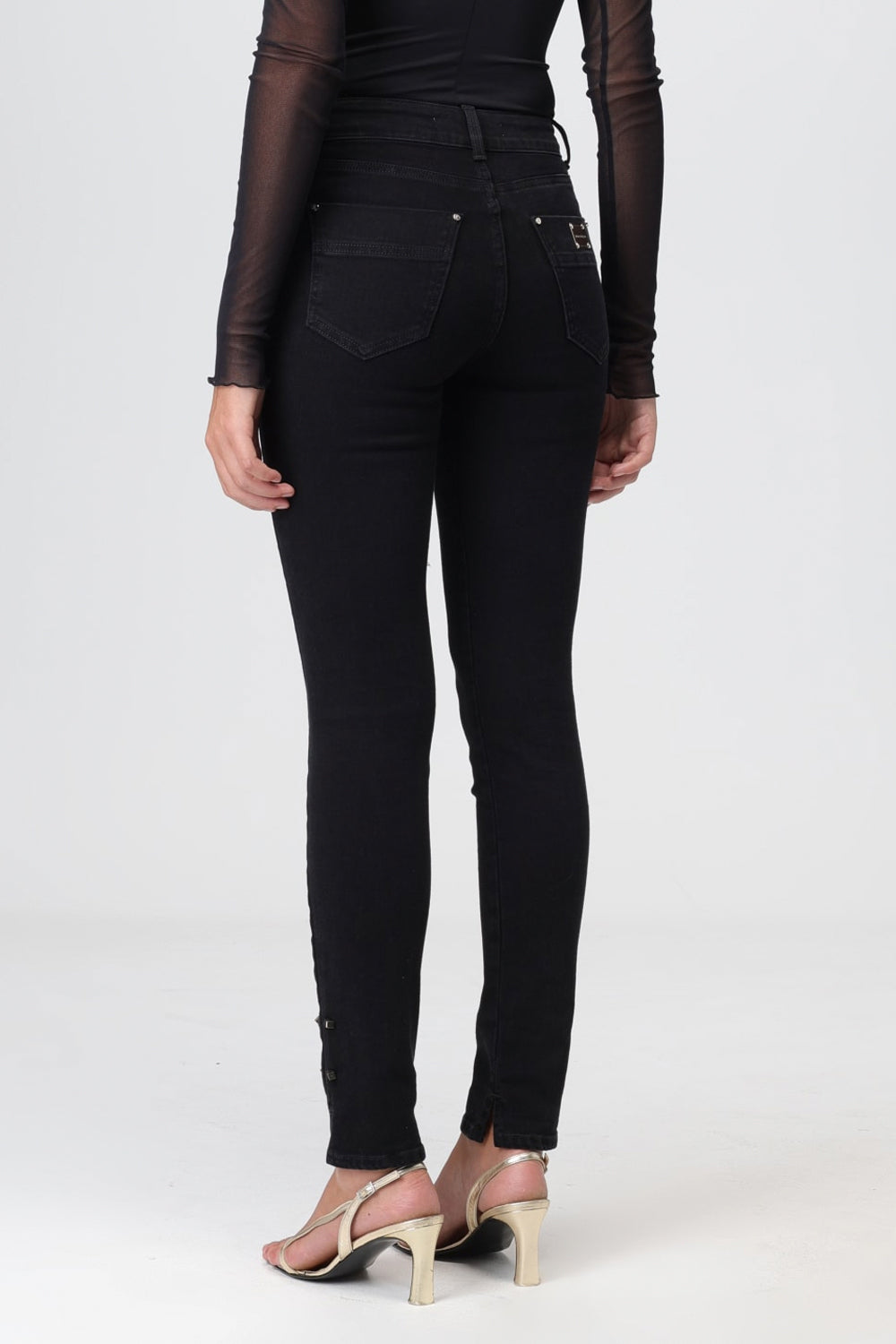 SIMONA CORSELLINI Jeans con dettaglio chiodi SIMONA CORSELLINI