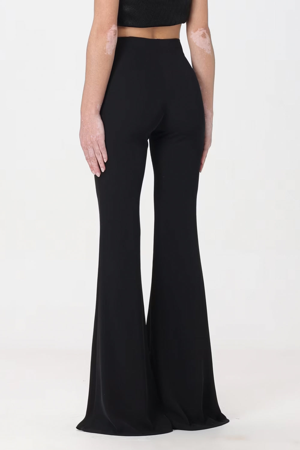 SIMONA CORSELLINI Pantalone a zampa con accessorio su bustino SIMONA CORSELLINI