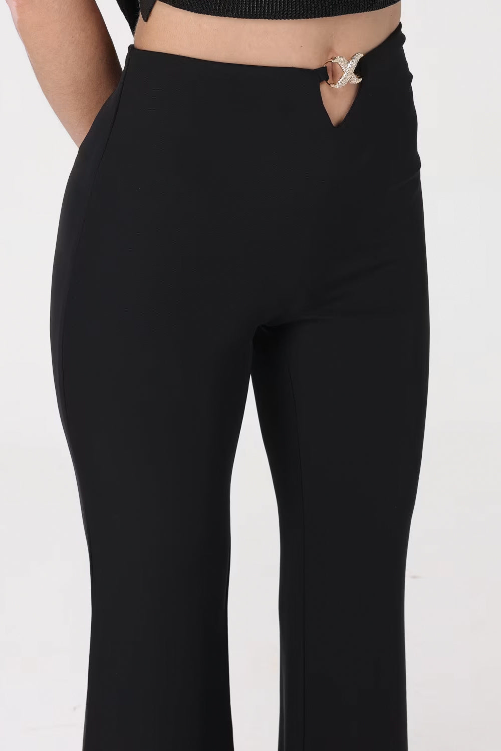 SIMONA CORSELLINI Pantalone a zampa con accessorio su bustino SIMONA CORSELLINI