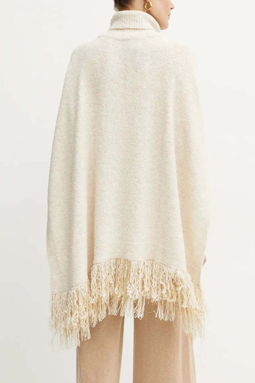 SIMONA CORSELLINI Poncho in maglia con frange Uncategorized SIMONA CORSELLINI