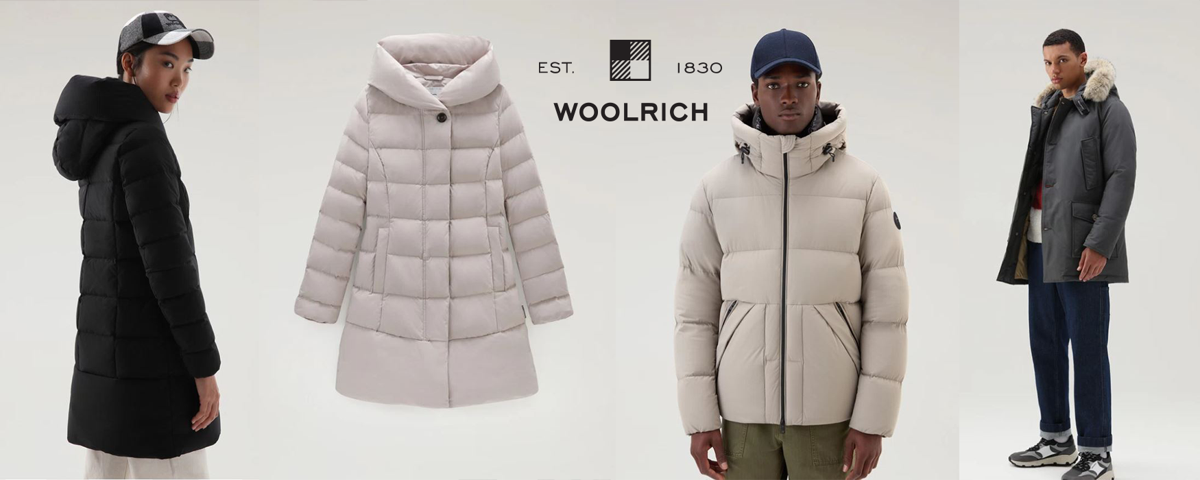 woolrich uomo e donna negli iconici Artic Parka , puffy prescot , anorak Woolrich