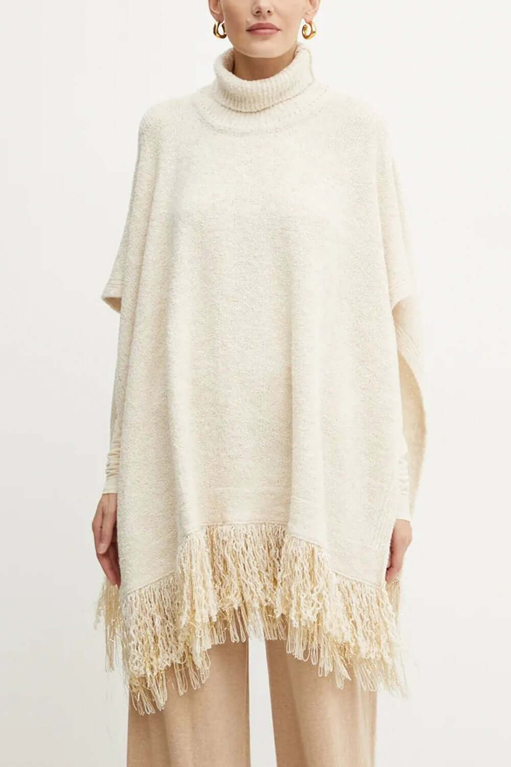 SIMONA CORSELLINI Poncho in maglia con frange Uncategorized SIMONA CORSELLINI