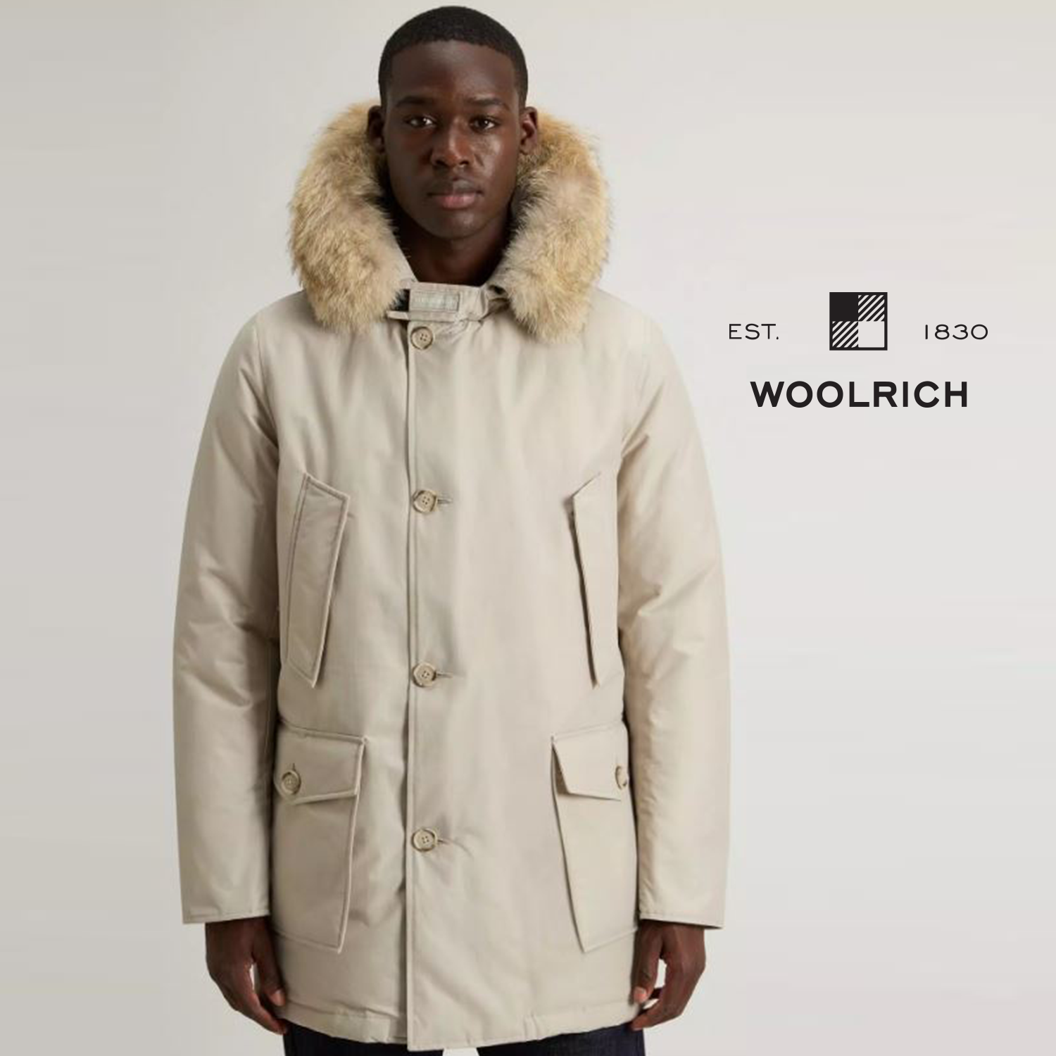 woolrich uomo e donna negli iconici Artic Parka , puffy prescot , anorak Woolrich 